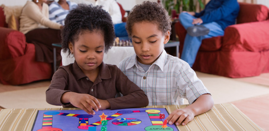 Two children playing board games