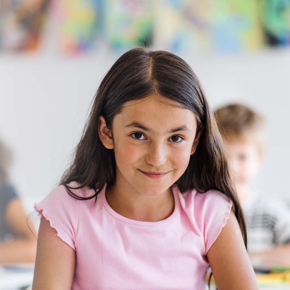 Child learning at a computer