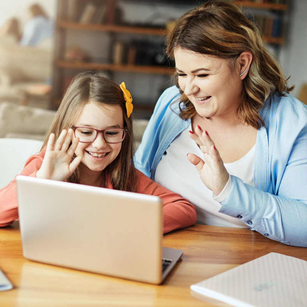 A young student in the enrichment tutoring specialty service is studying with her tutor.